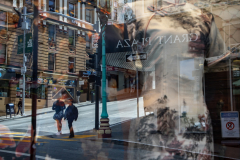 Chinatown in San Francisco, California, known for its vibrant streets and cultural landmarks. - Window Reflection