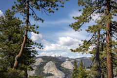 Panoramic views from Glacier Point overlooking Yosemite Valley, including Half Dome and waterfalls.
