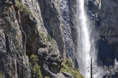 Spring landscape of Yosemite Valley with waterfalls, trees, and granite cliffs in California. 