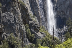 Spring landscape of Yosemite Valley with waterfalls, trees, and granite cliffs in California. 