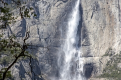 Spring landscape of Yosemite Valley with waterfalls, trees, and granite cliffs in California. 
