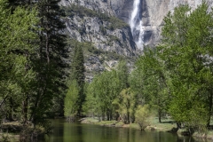 Spring landscape of Yosemite Valley with waterfalls, trees, and granite cliffs in California. 