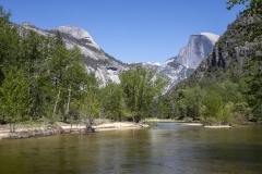 Spring landscape of Yosemite Valley with waterfalls, trees, and granite cliffs in California. 
