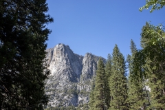 Spring landscape of Yosemite Valley with waterfalls, trees, and granite cliffs in California. 
