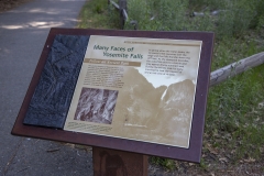 Spring landscape of Yosemite Valley with waterfalls, trees, and granite cliffs in California.