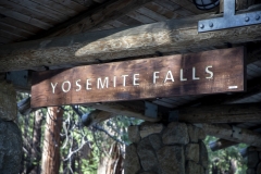 Spring landscape of Yosemite Valley with waterfalls, trees, and granite cliffs in California.