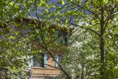 The Ahwahnee Hotel in Yosemite Valley surrounded by trees and mountains in the Sierra Nevada.