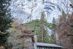 The Ahwahnee Hotel in Yosemite Valley surrounded by trees and mountains in the Sierra Nevada.