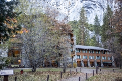 The Ahwahnee Hotel in Yosemite Valley surrounded by trees and mountains in the Sierra Nevada.