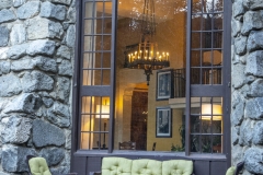 The Ahwahnee Hotel in Yosemite Valley surrounded by trees and mountains in the Sierra Nevada.