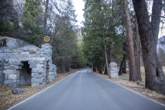 The Ahwahnee Hotel in Yosemite Valley surrounded by trees and mountains in the Sierra Nevada.